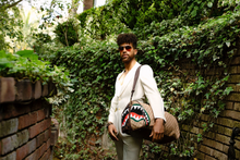 Sprayground Sharks in Paris vs Florence Duffle